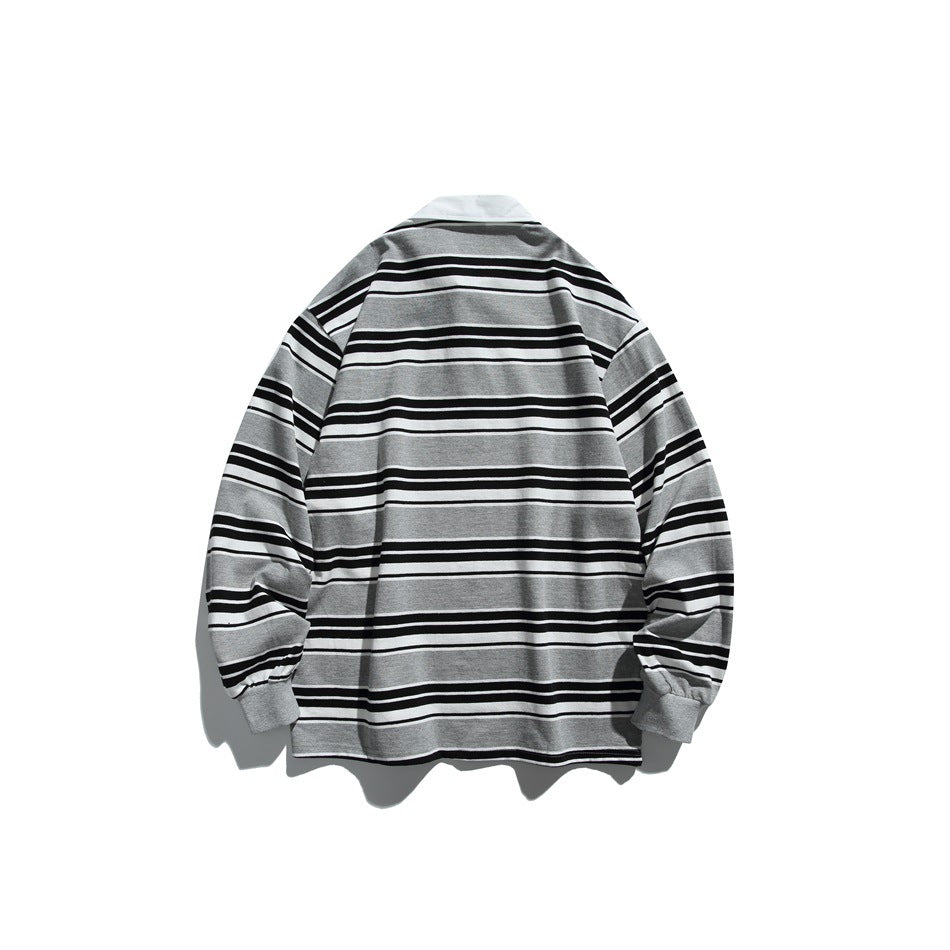 Back view of a gray long-sleeve collared shirt with bold black and white horizontal stripes.