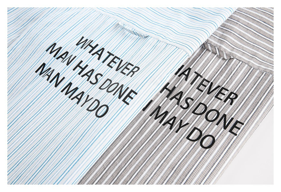 Blue-and-white and gray-and-white striped shirts shown with black lettering printed across their backs.