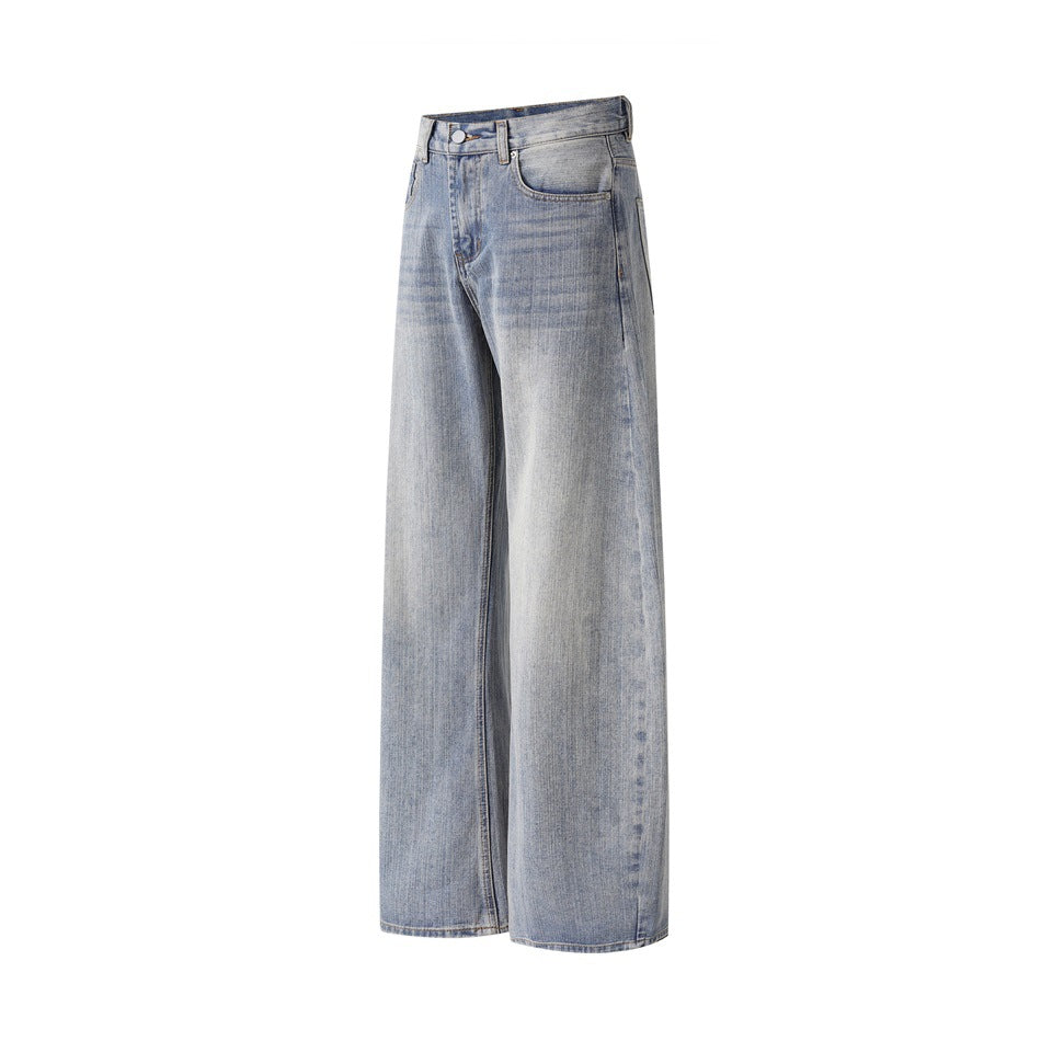 Full front view of light washed blue-gray jeans with a high waist and wide, straight legs.