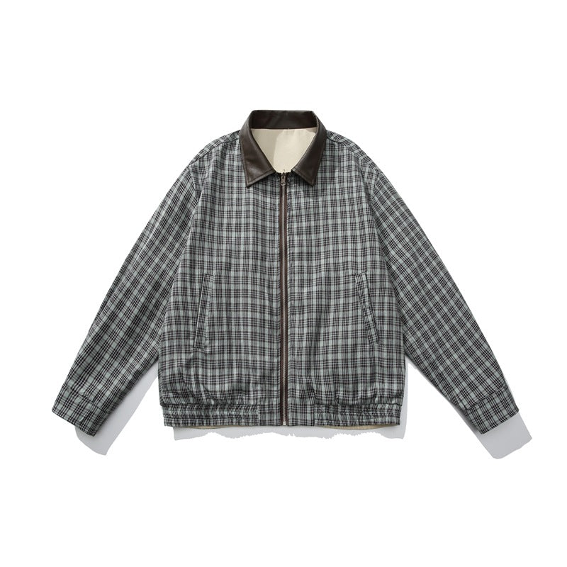Front view of a gray plaid zip jacket with a dark collar, angled pockets and a gathered hem.