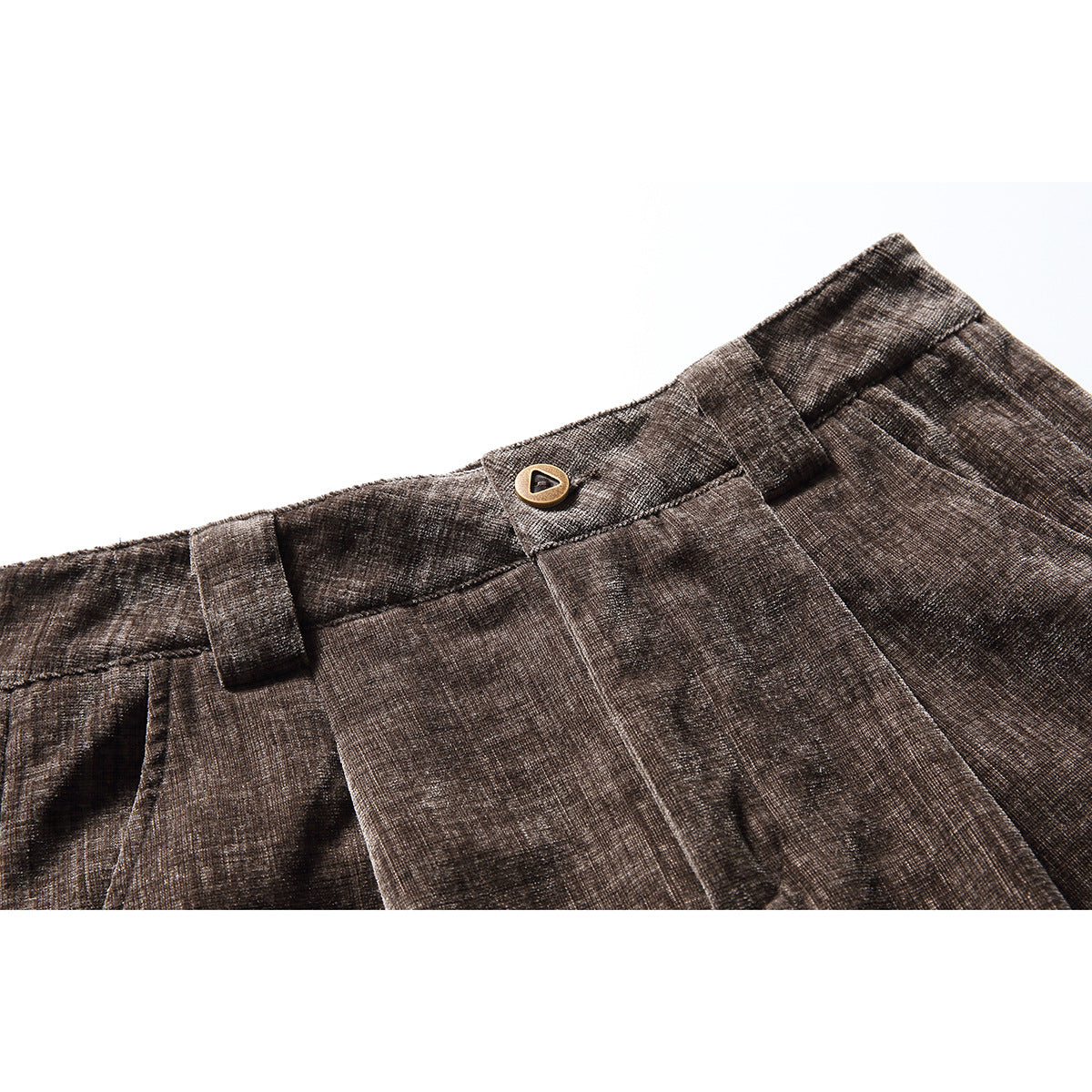 Close-up of brown textured trousers showing the waistband, belt loops, pleats and gold-tone button.