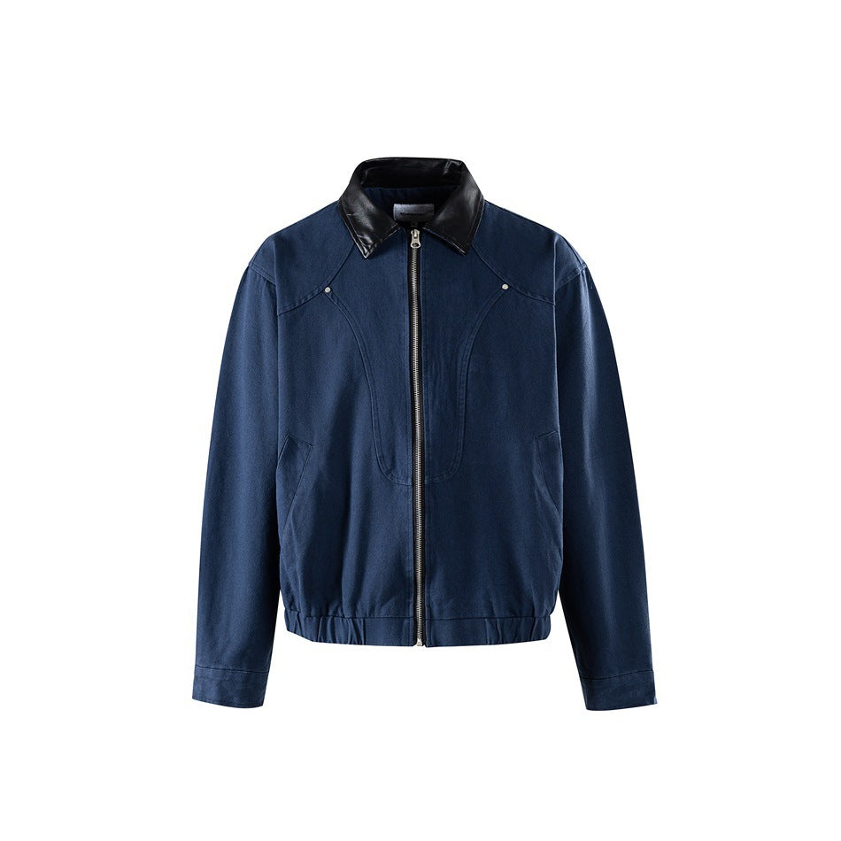 Navy blue zip-front jacket with black glossy collar, curved front seams, rivets and elastic hem, flat front view