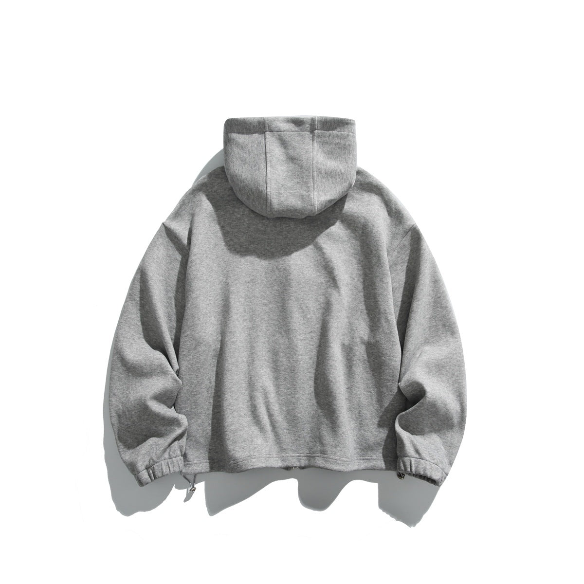 Back view of a heather gray hooded jacket with long sleeves and gathered cuffs.