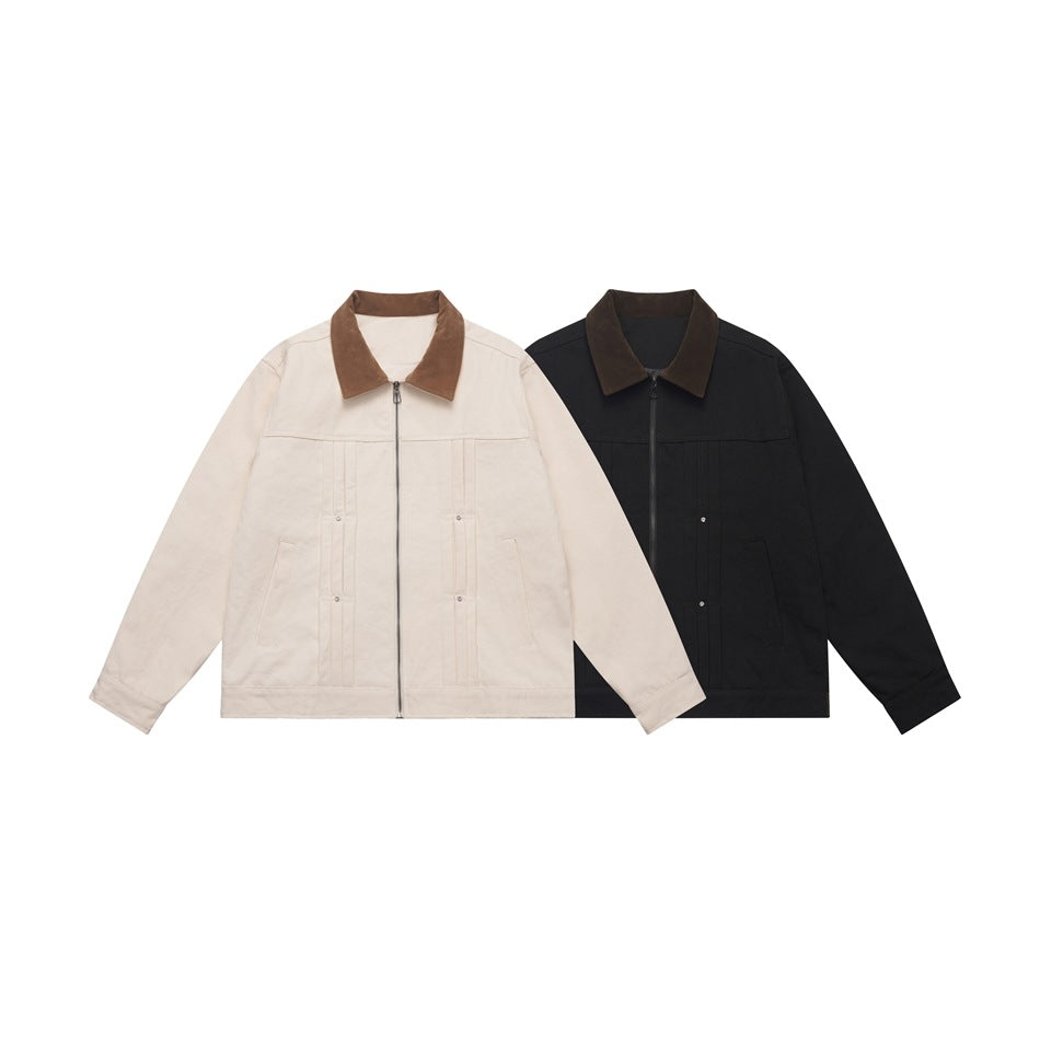 Front view of cream and black jackets with brown collars, front zippers, and multiple pockets.
