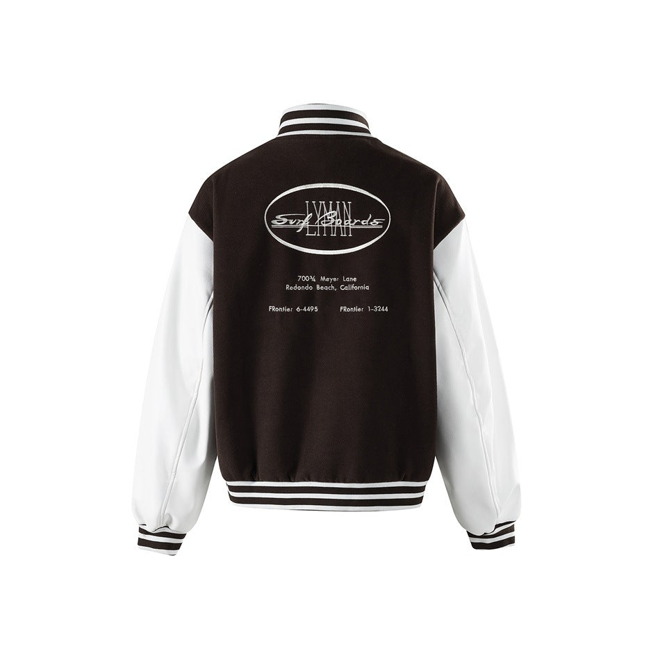 Back view of a brown varsity jacket with white sleeves, striped trim, and a large oval graphic with English lettering.
