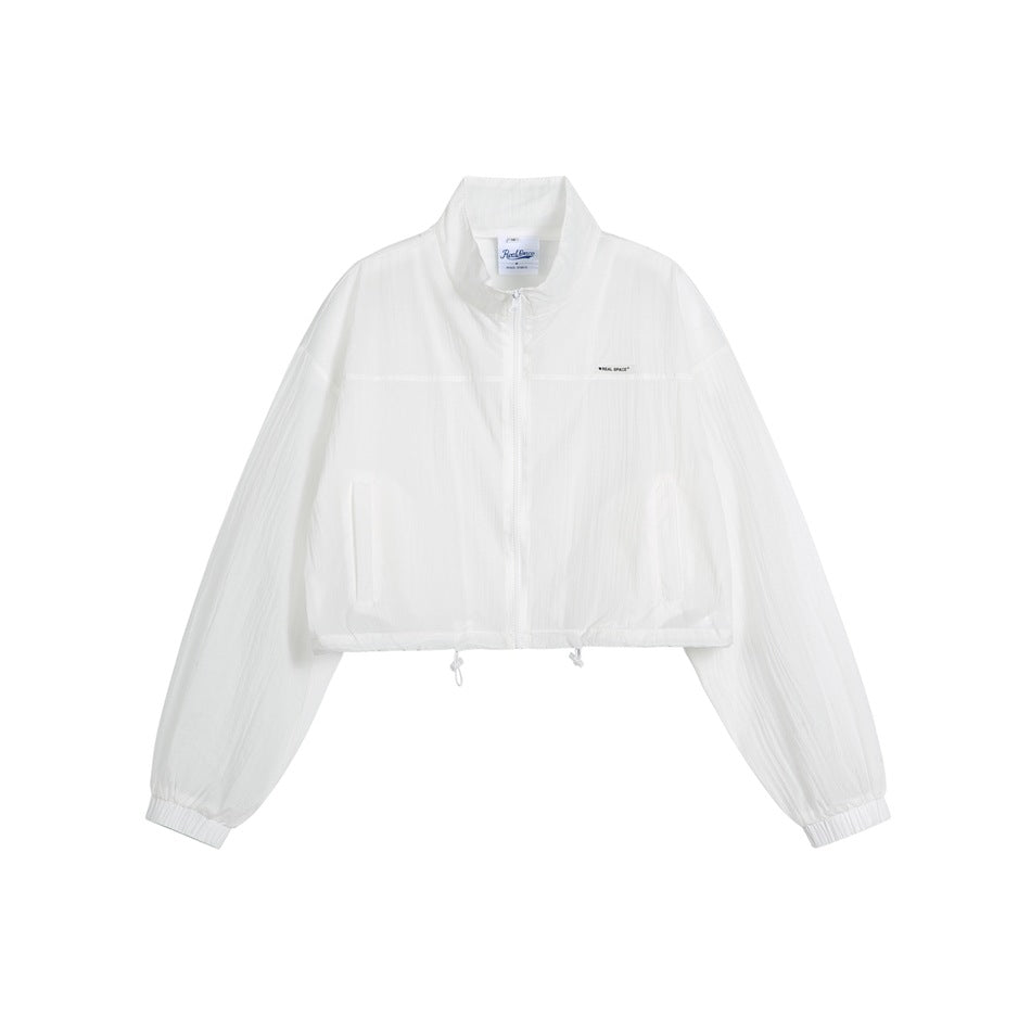 White cropped zip-up jacket with stand collar, drawstring hem and elastic cuffs, flat front view