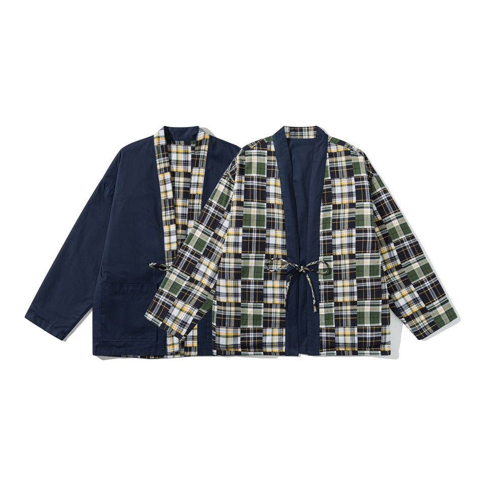 Two front views of a reversible jacket: one navy with plaid trim and one plaid with navy trim and tie.