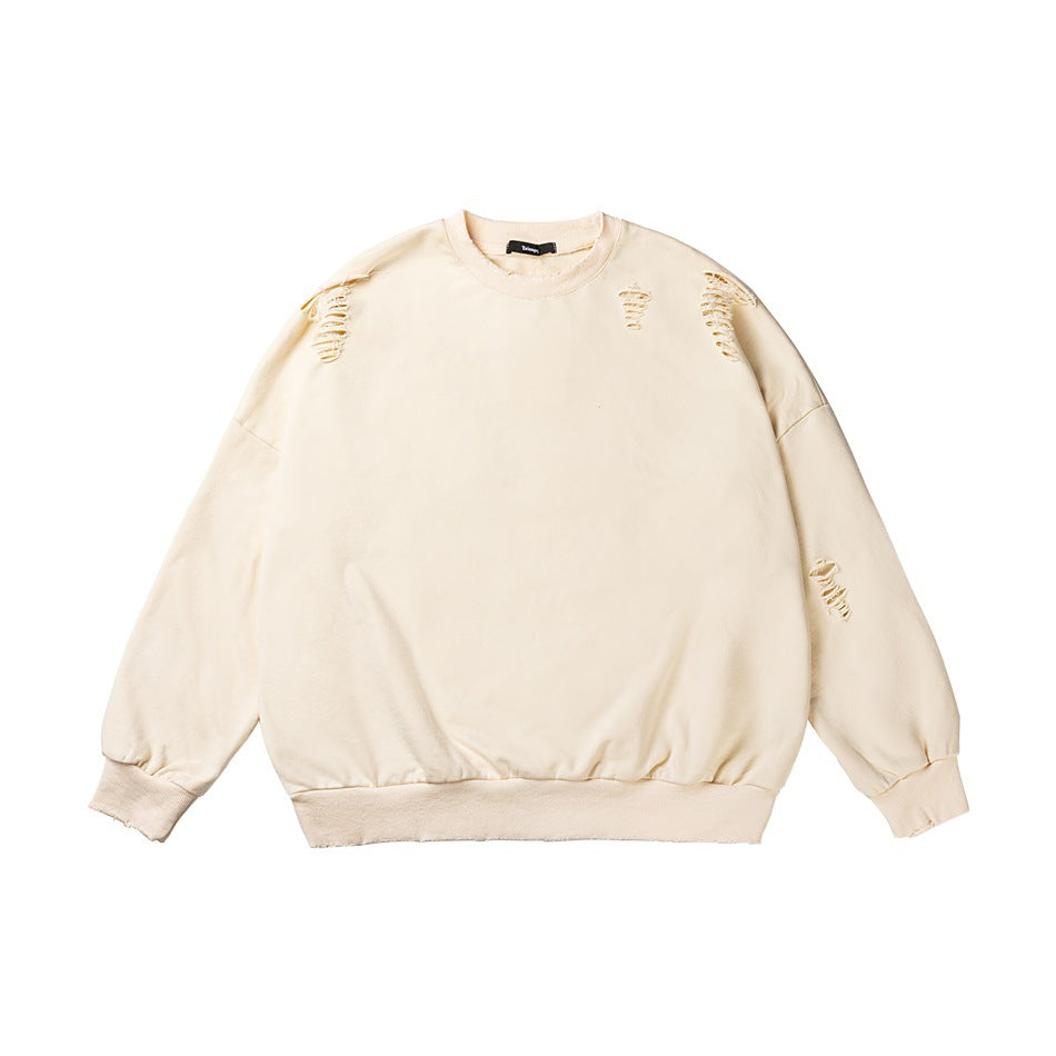 Khaki apricot distressed crewneck sweatshirt flat lay with dropped shoulders and ribbed cuffs