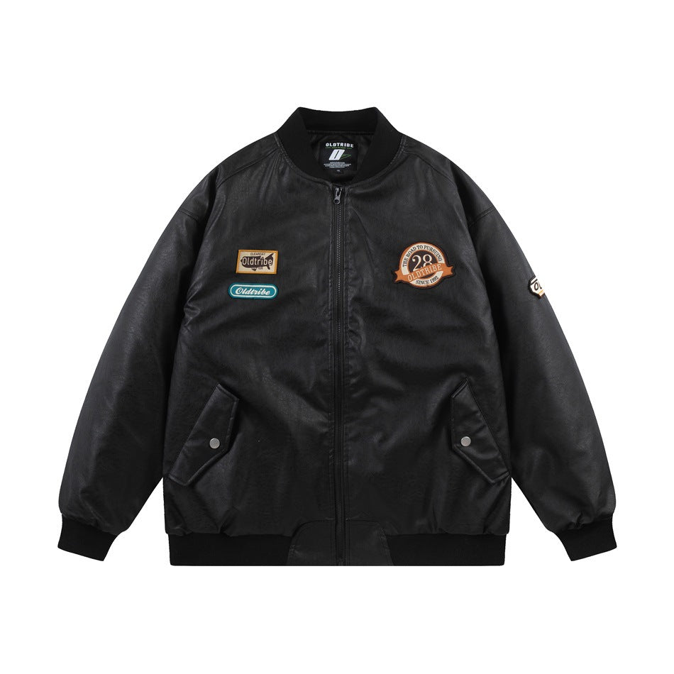 Black faux-leather-look bomber jacket flat lay with zipper, flap pockets, ribbed trim and embroidered patches