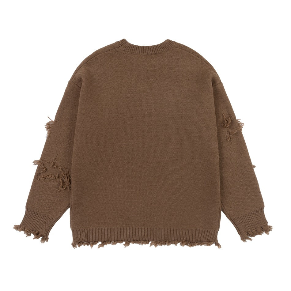 Back of a brown crewneck sweater with distressed sleeve accents, ribbed trim, and frayed edges.