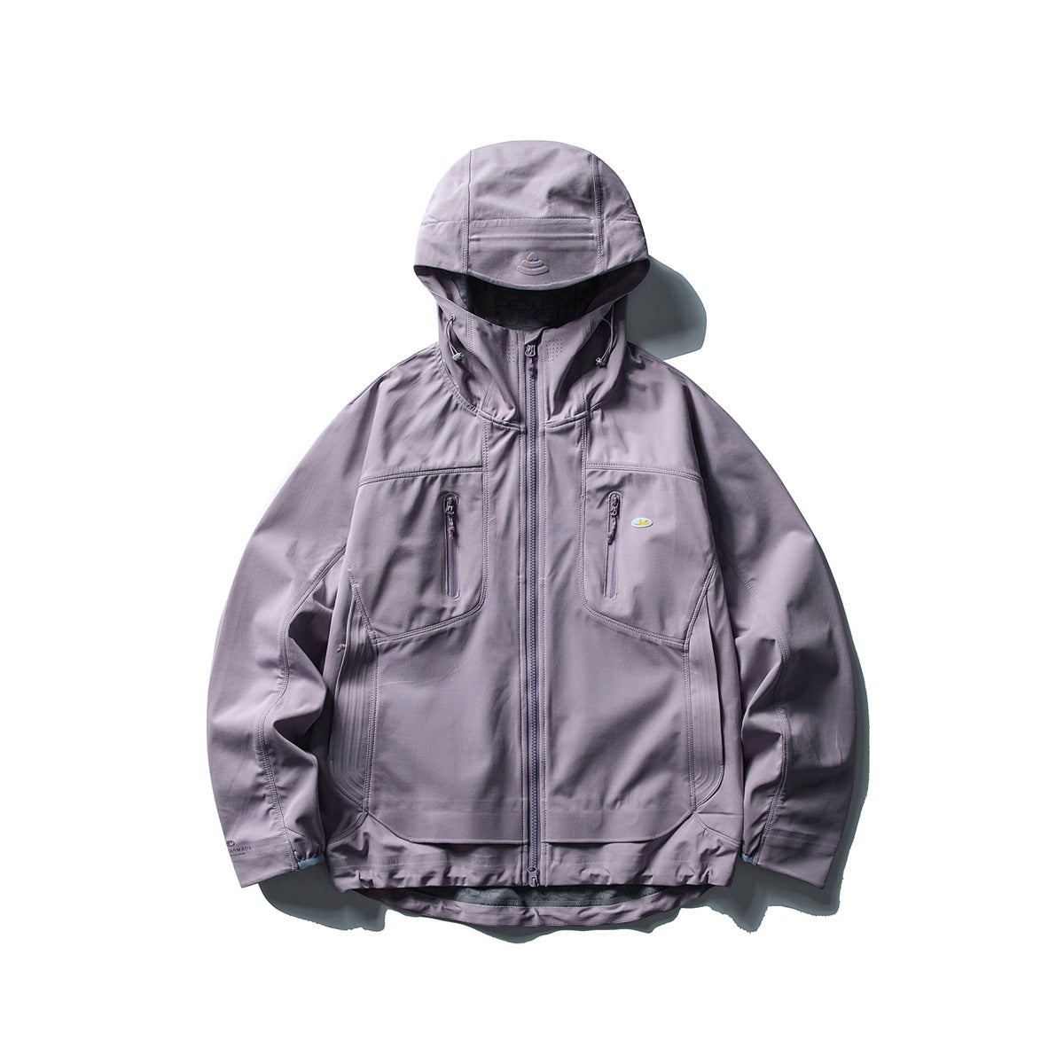 Muted lavender-purple hooded zip jacket with zipped chest pockets and a curved layered hem, flat lay