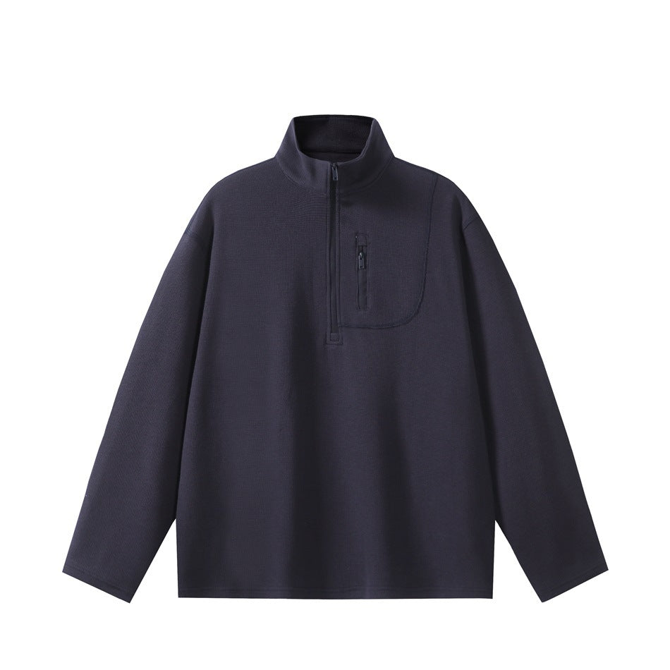 Navy half-zip waffle-knit pullover with stand collar and zippered chest pocket, flat front view