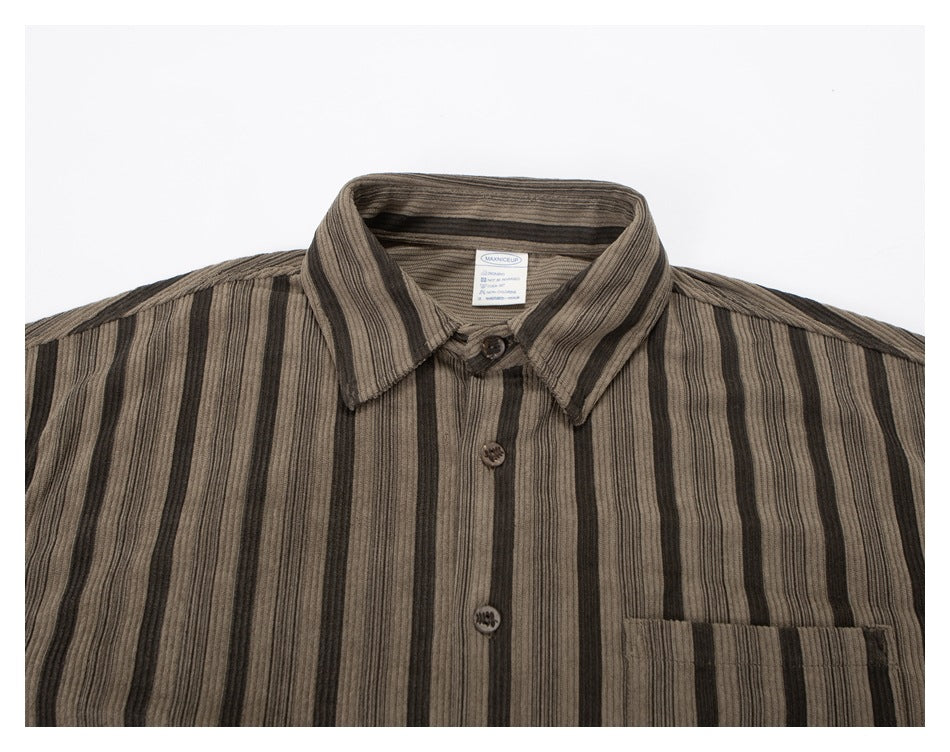 Close front view of a brown-gray striped button-up shirt with a pointed collar and chest pocket.