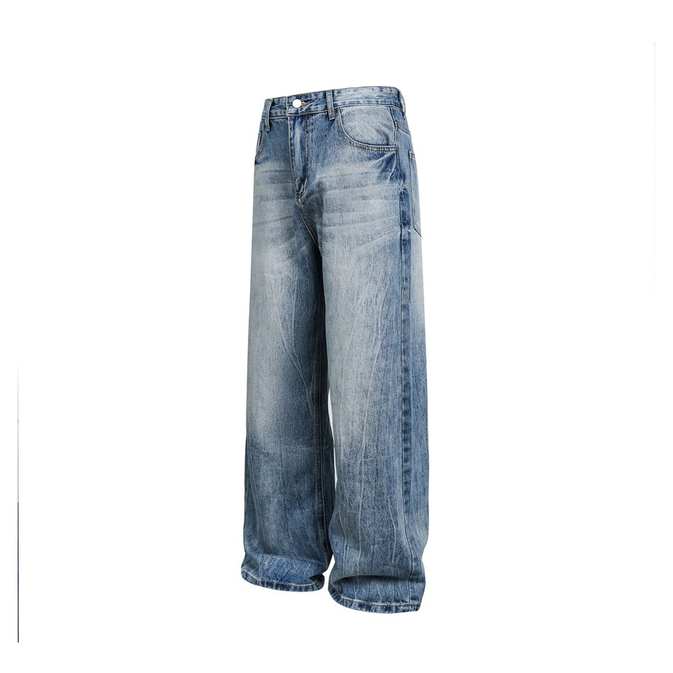Front view of faded light-blue wide-leg jeans with a button closure, belt loops, and front pockets on a white background.