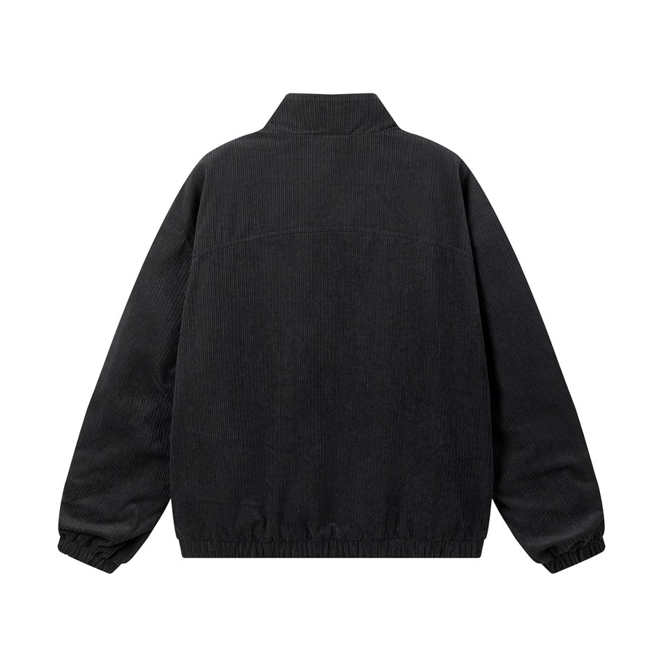 Back view of a black ribbed jacket with a raised collar and elasticated cuffs and hem.