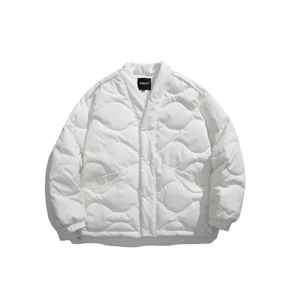 White quilted V-neck jacket with wavy stitching, snap front and slanted pockets, flat lay front view