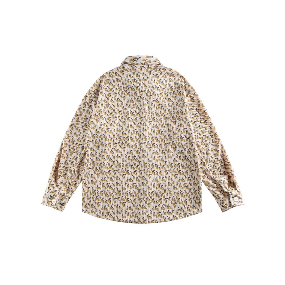 Back flat lay of a beige long-sleeve shirt with a small mustard and dark floral print.