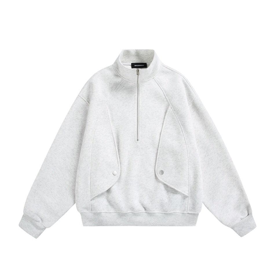 Light heather gray half-zip stand-collar sweatshirt, flat lay front, with curved panel seams, snap buttons and ribbed hem