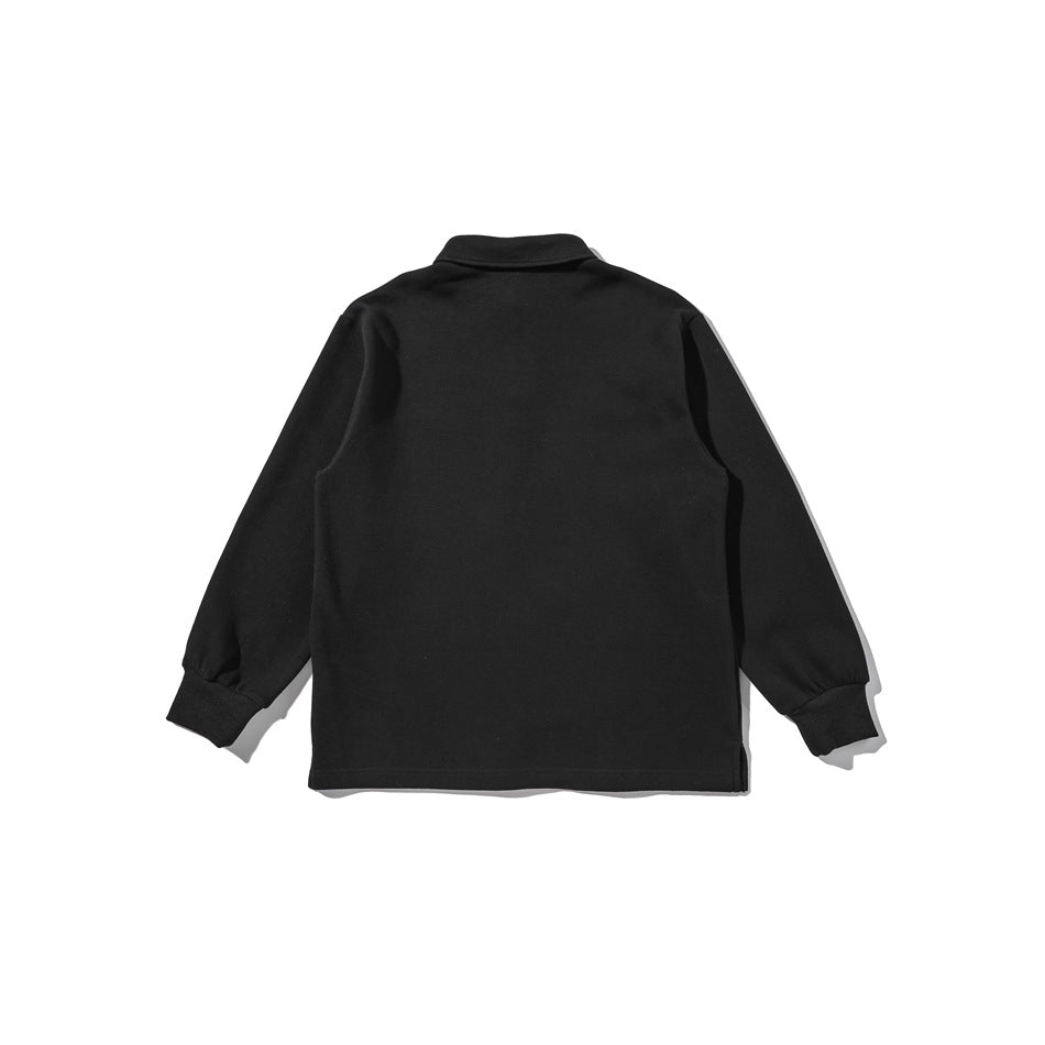 Back view of a plain black long-sleeved collared pullover with ribbed cuffs and hem.