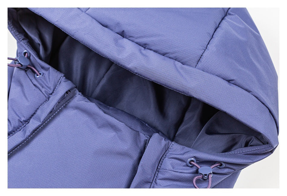 Close-up of a blue-purple jacket hood, showing the dark lining and adjustable drawcords.