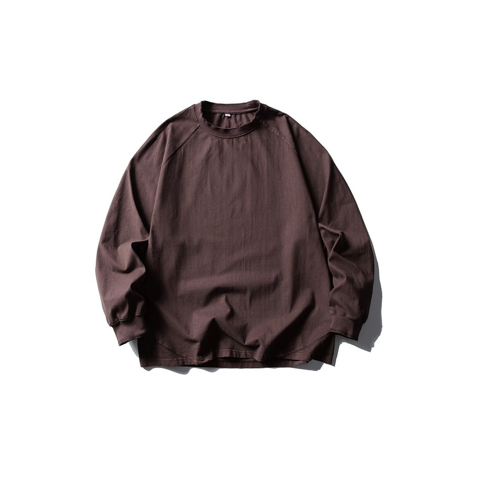 Brown long-sleeve raglan crew-neck T-shirt flat lay, front view