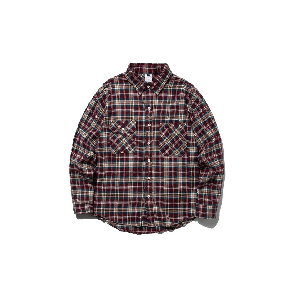 Red and burgundy plaid long-sleeve button-up shirt with two chest pockets, front view flat lay