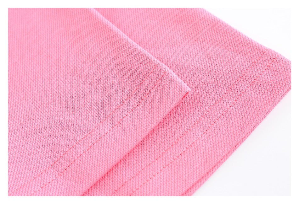 Close-up of the pink sweatshirt’s double-stitched hem.