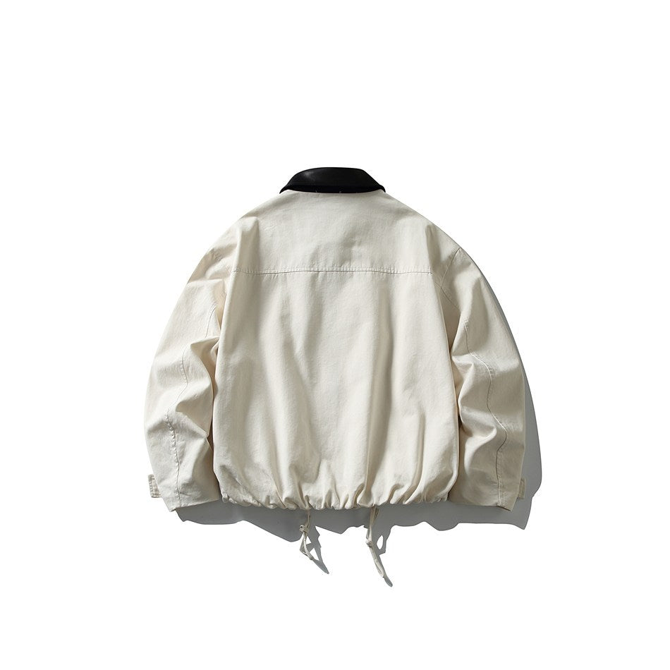 Back view of off-white jacket with black collar, yoke seam, shaped sleeve seams and drawstring hem, flat view