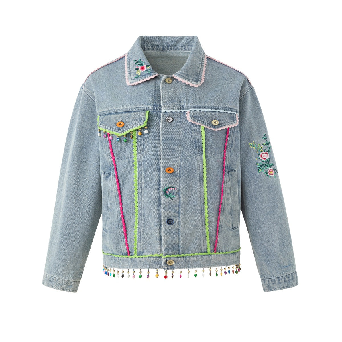 Washed blue denim jacket with pink and green rickrack trim, floral embroidery and beaded hem fringe, front view