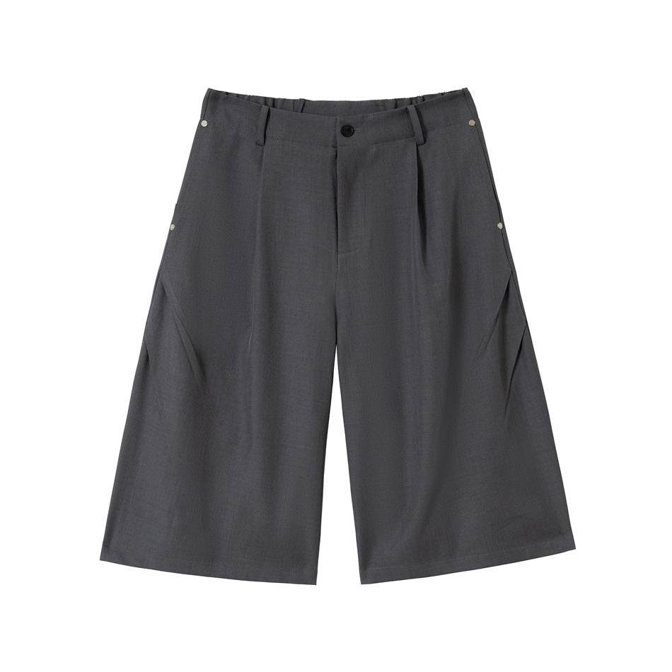 Grey knee-length wide-leg pleated shorts, front view flat lay