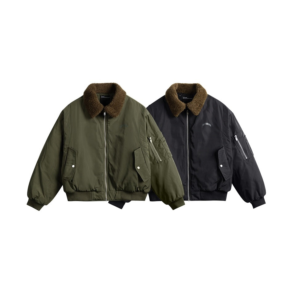 Two bomber jackets shown from the front: one olive and one black, both with brown plush collars and utility pockets.