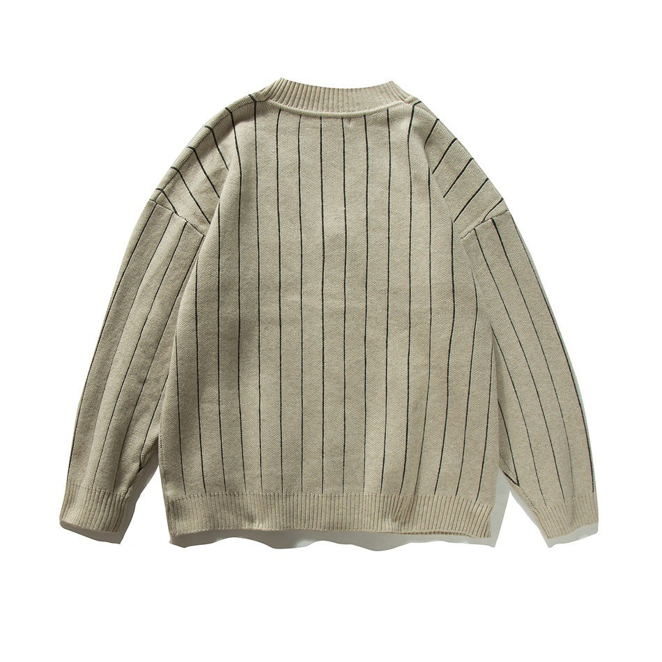 Back view of beige knit cardigan with dark vertical pinstripes, ribbed neckline, cuffs and hem, flat lay