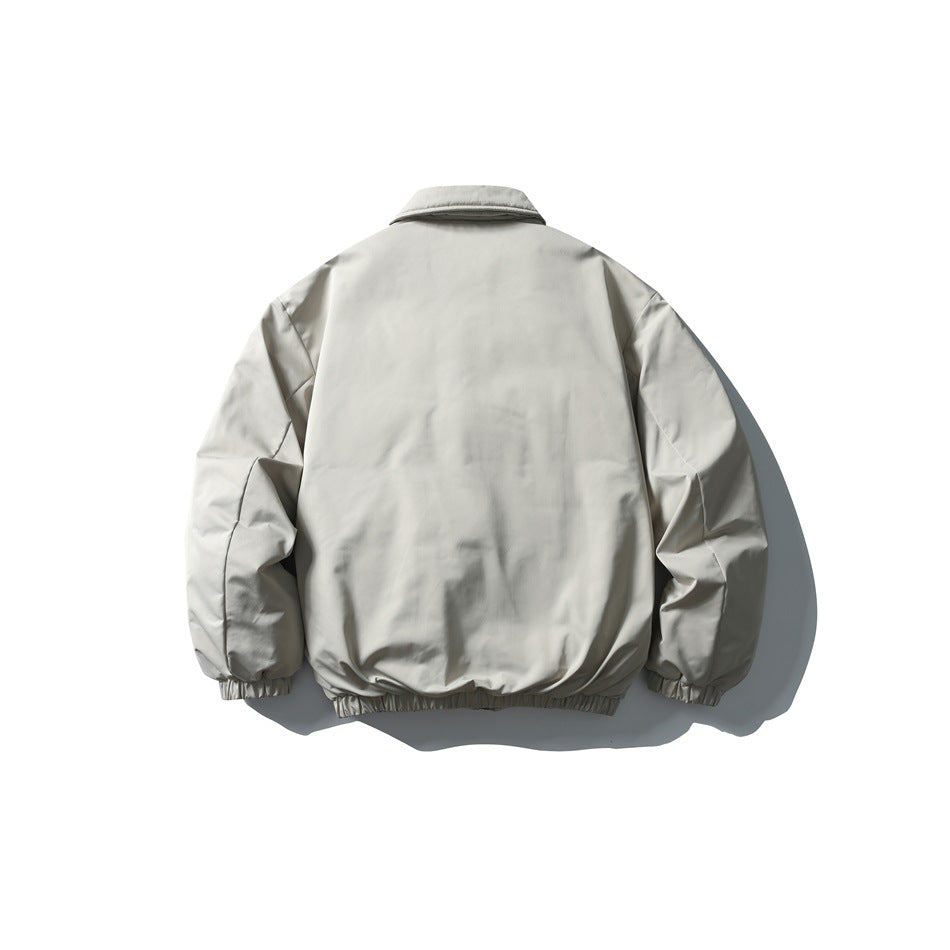 Back view of a light gray jacket with a collar, gathered elastic cuffs, and an elastic hem.