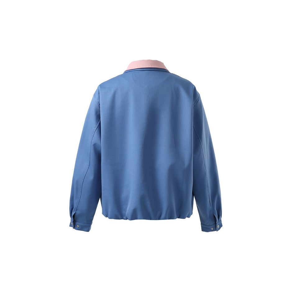 Back view of blue jacket with pink collar, gathered hem and snap-button cuffs