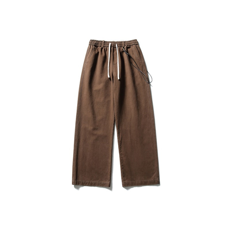 Brown wide-leg drawstring pants with elastic waist, flat lay front view with black cord detail