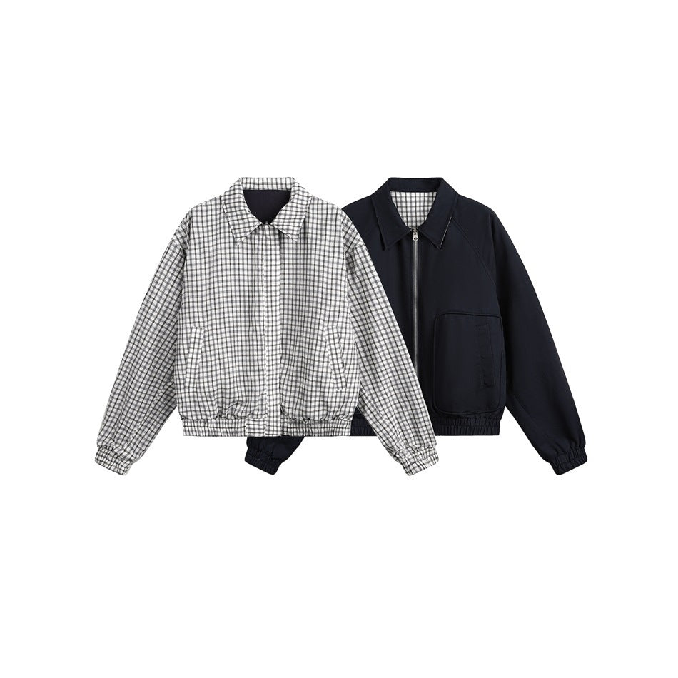 Reversible jacket shown both ways: black-and-white gingham check side and solid navy side with zip and patch pocket