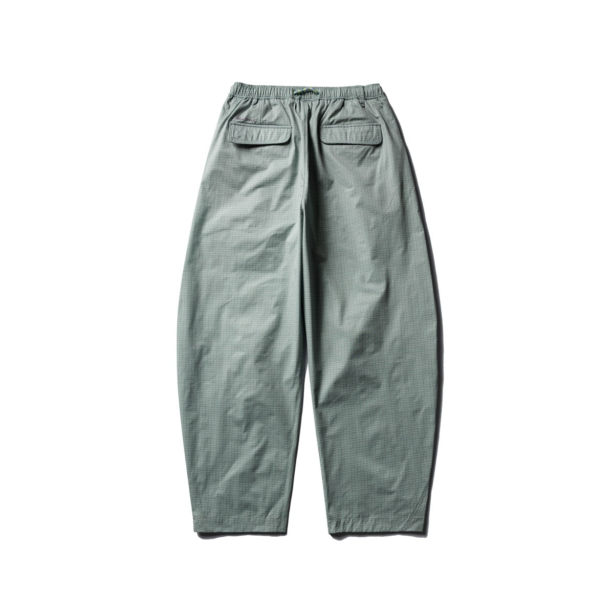 Back view of pale sage check trousers with an elastic drawstring waist and two flap back pockets.