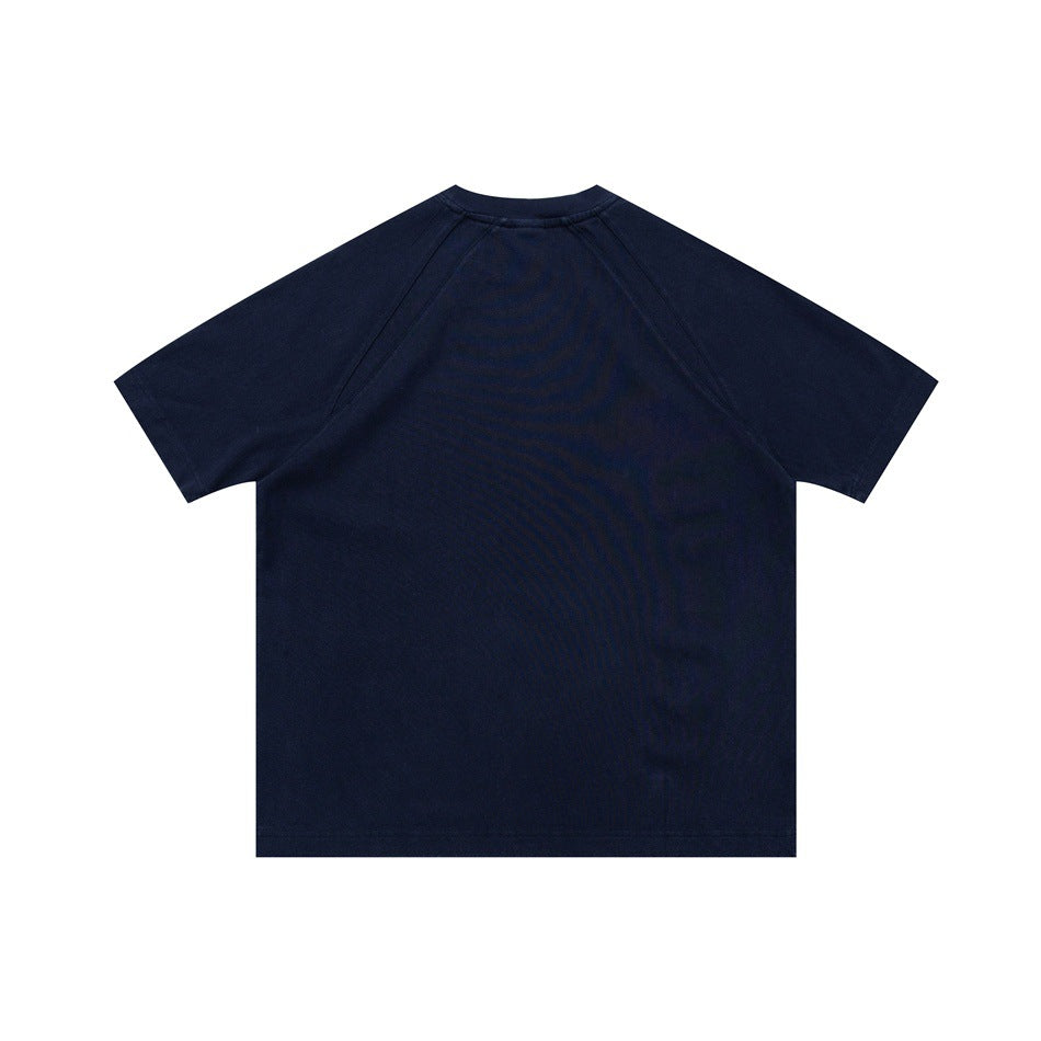 Back view of a dark navy short-sleeve raglan crew-neck shirt laid flat.
