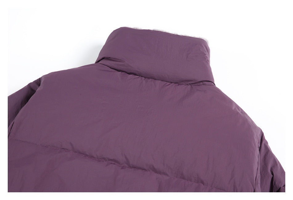 Cropped rear view of a plum-purple padded jacket with a tall collar and horizontal quilting.