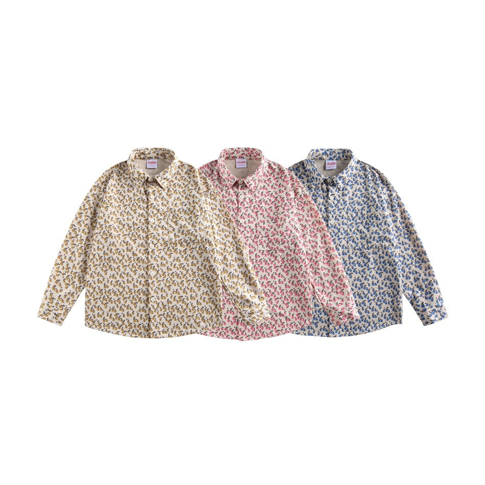 Three collared floral button-up shirts displayed together in beige with mustard, pink, and blue print colorways.