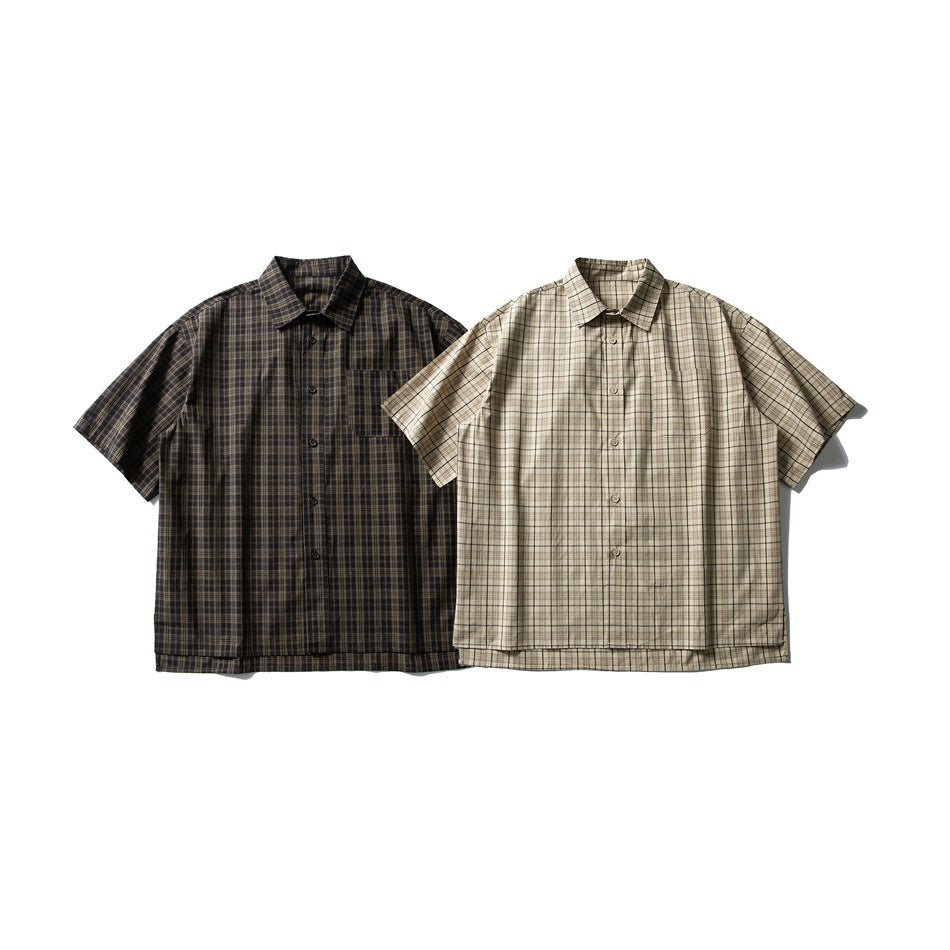 Two short-sleeve button-up plaid shirts shown from the front: one dark brown and one beige.
