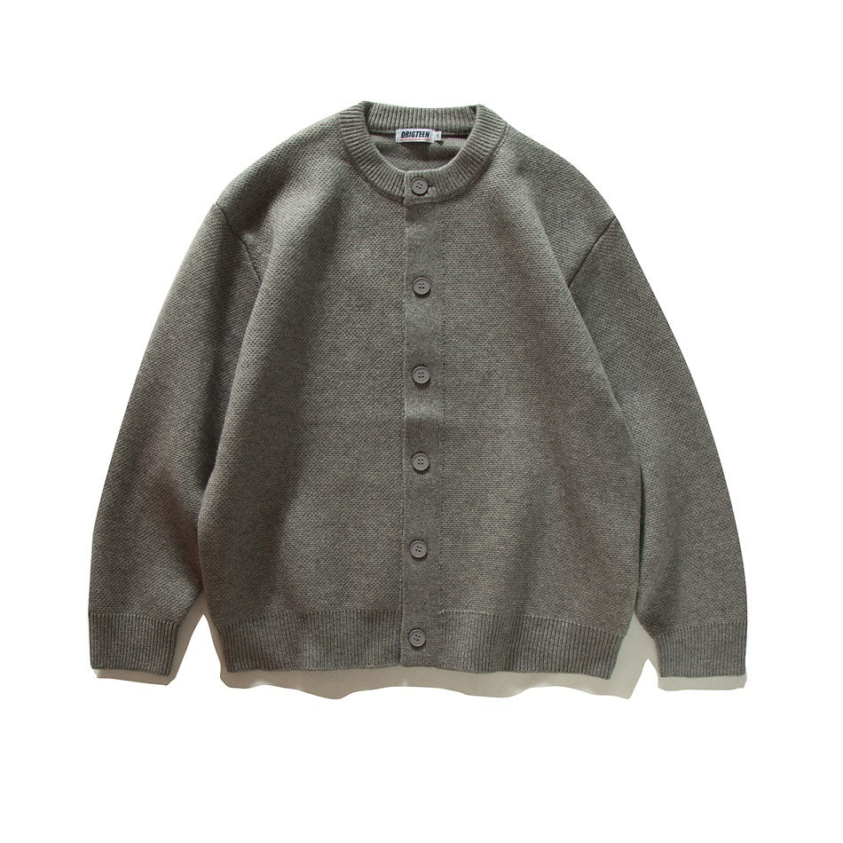 Gray button-front knit cardigan with ribbed round neckline, cuffs and hem, flat lay front view