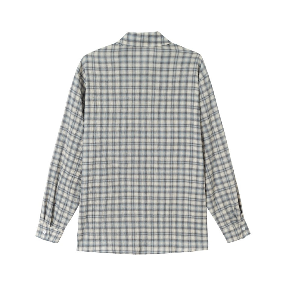 Back view of a long-sleeve shirt in a gray, blue, and cream plaid pattern.