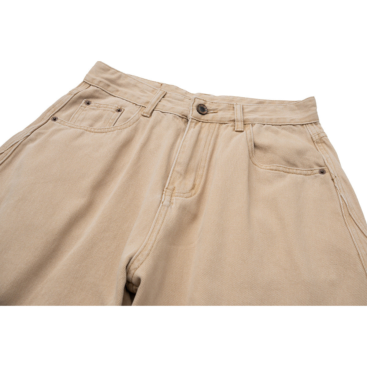 Close-up of beige pants showing the front waistband, button, belt loops and pockets.