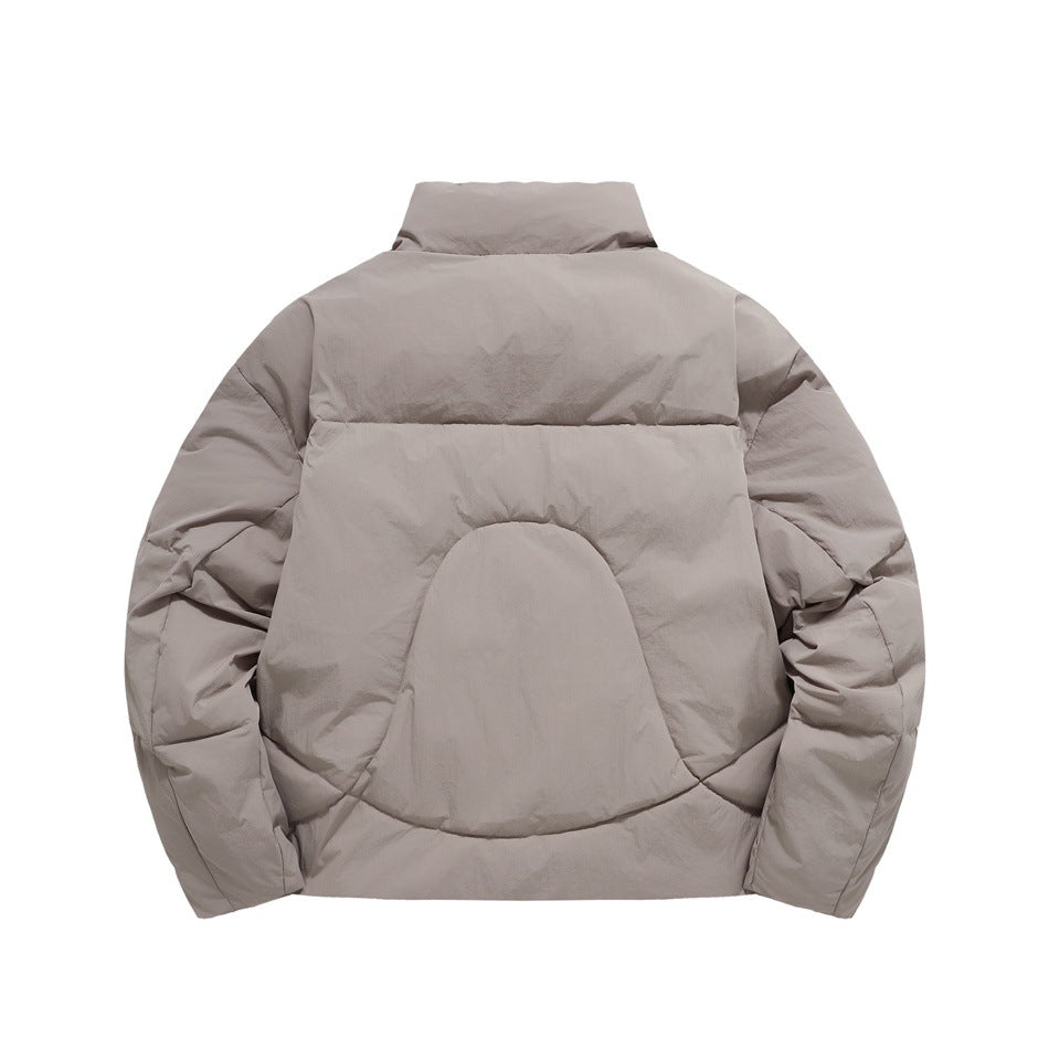 Back view of a taupe padded jacket with a high collar and a large rounded stitched panel.