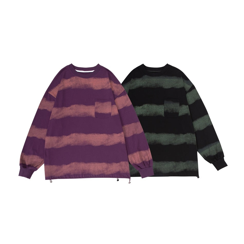 Two long-sleeve striped sweatshirts shown from the front: purple with muted rose stripes and black with faded green stripes.