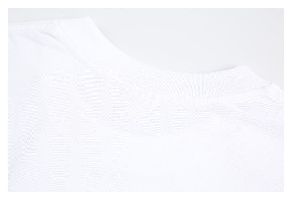Close-up of the back neckline and ribbed collar of a white shirt.