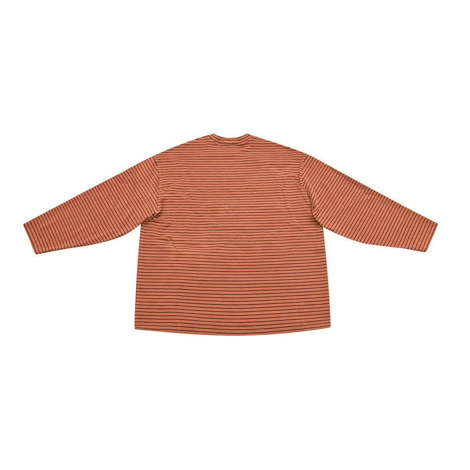 Back view of orange striped long-sleeve top with dark thin stripes, laid flat