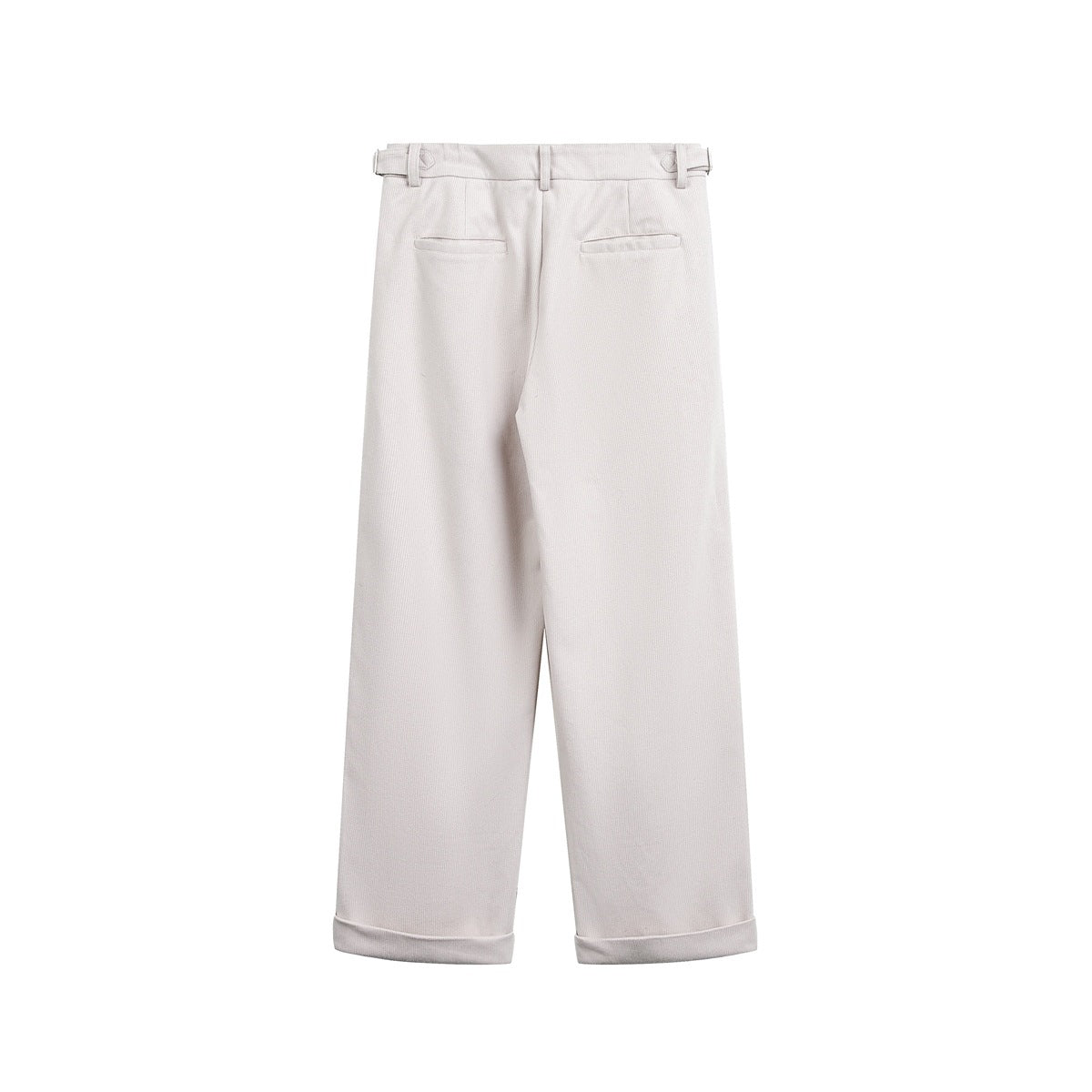 Beige wide-leg trousers, back view, with two welt pockets, side buckle tabs and cuffed hems