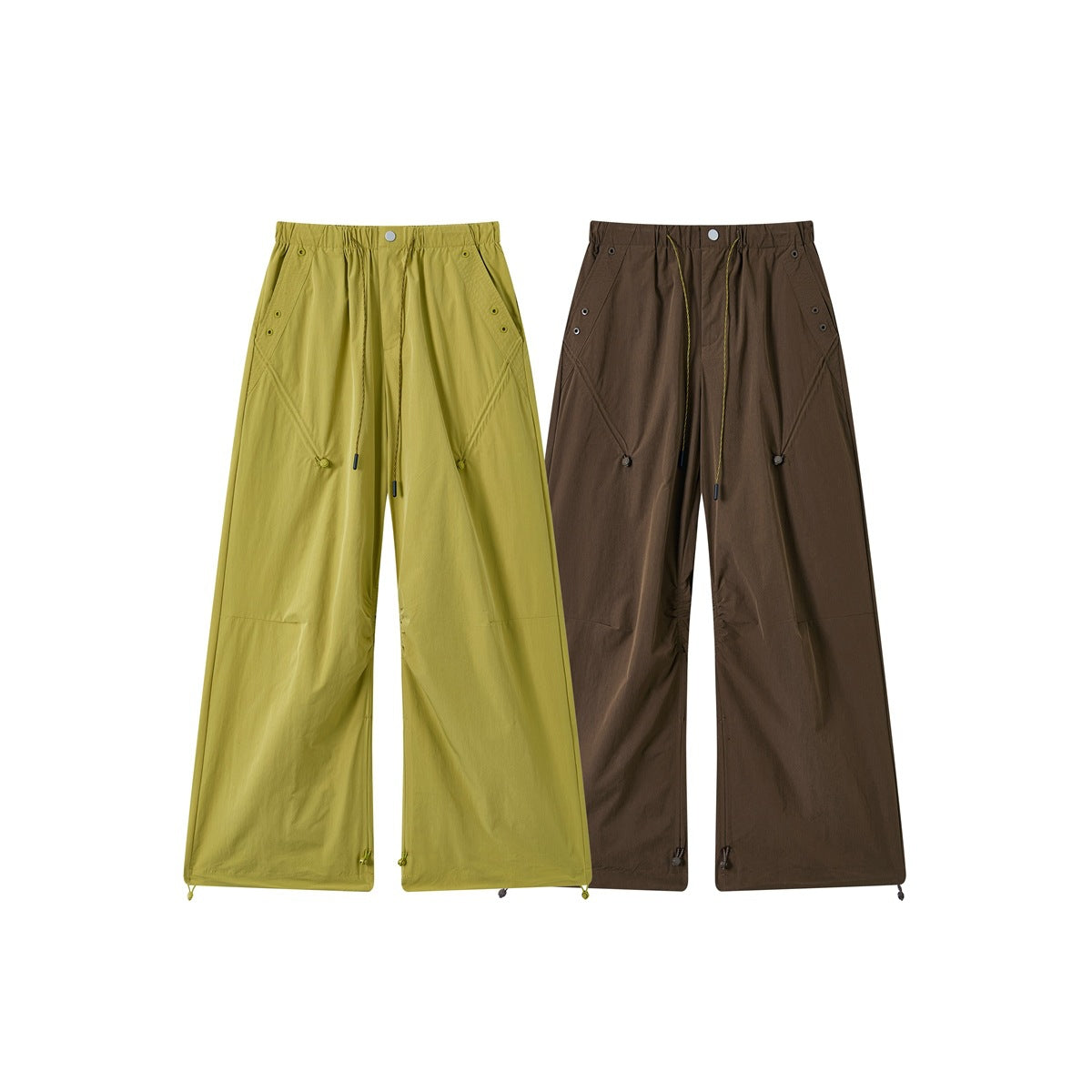 Two pairs of wide-leg trousers shown from the front in mustard yellow-green and dark brown, with drawcords and adjustable